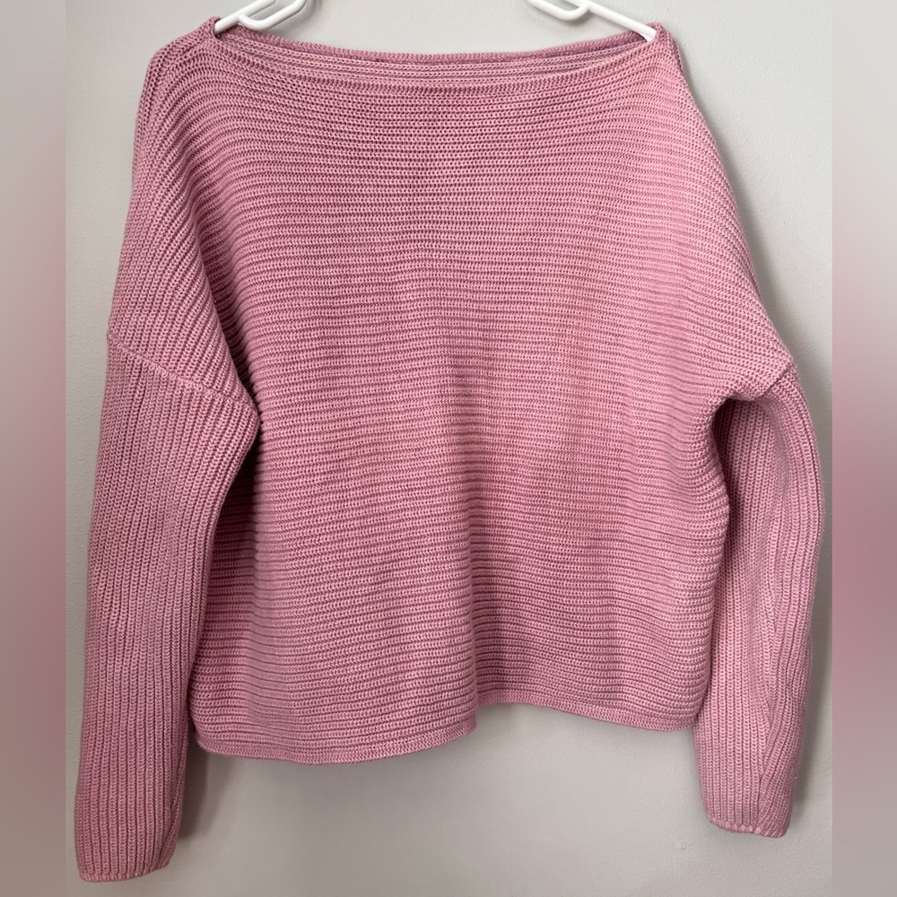 Pink off the shoulder crocheted sweater.